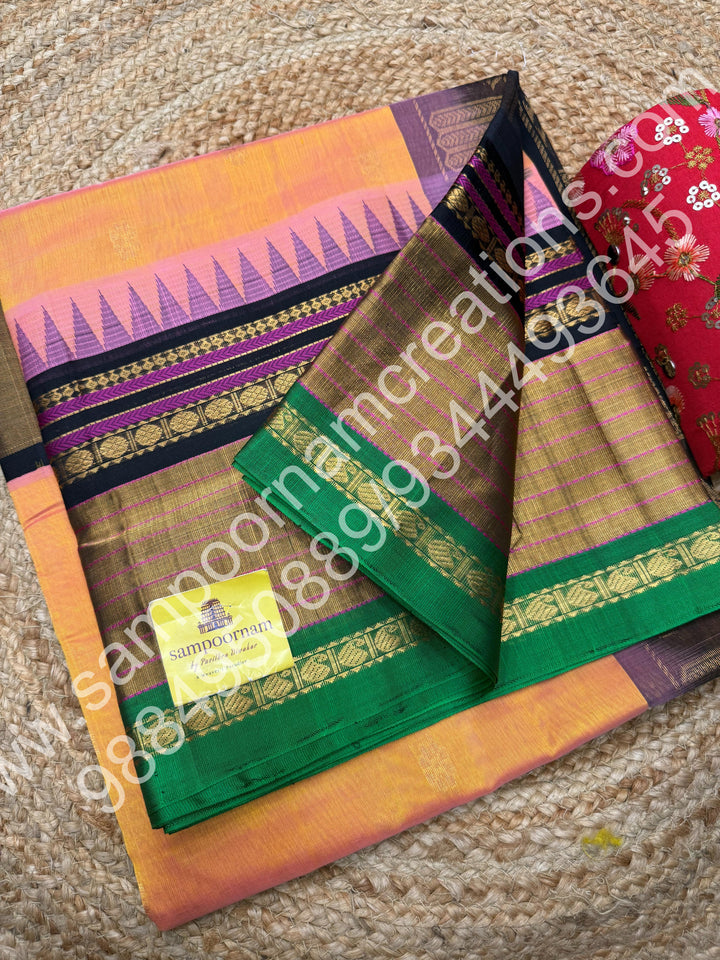 Peach with Black , rich floral Zari butta in the body , One side Long border and  Grand Pallu Korvai Silk Cotton Saree