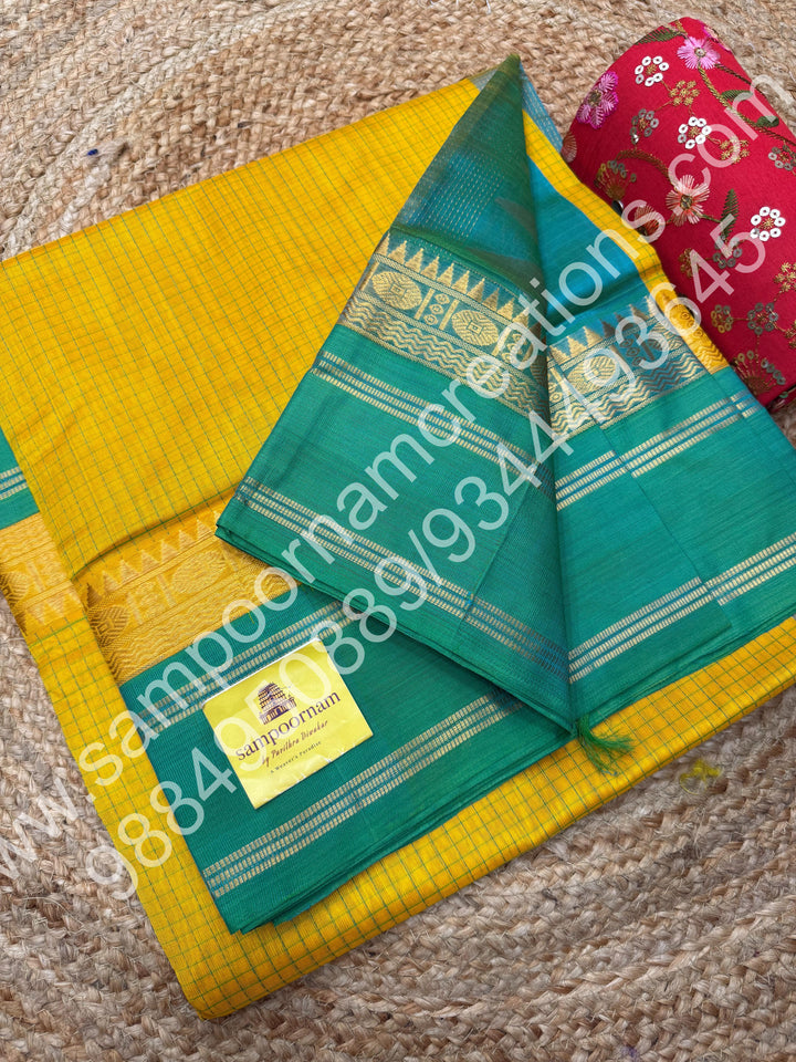 Turmeric Yellow with Ramar Green  , thread  Podi Kattam in the body , rettapet border and rich Pallu Korvai Silk Cotton Saree