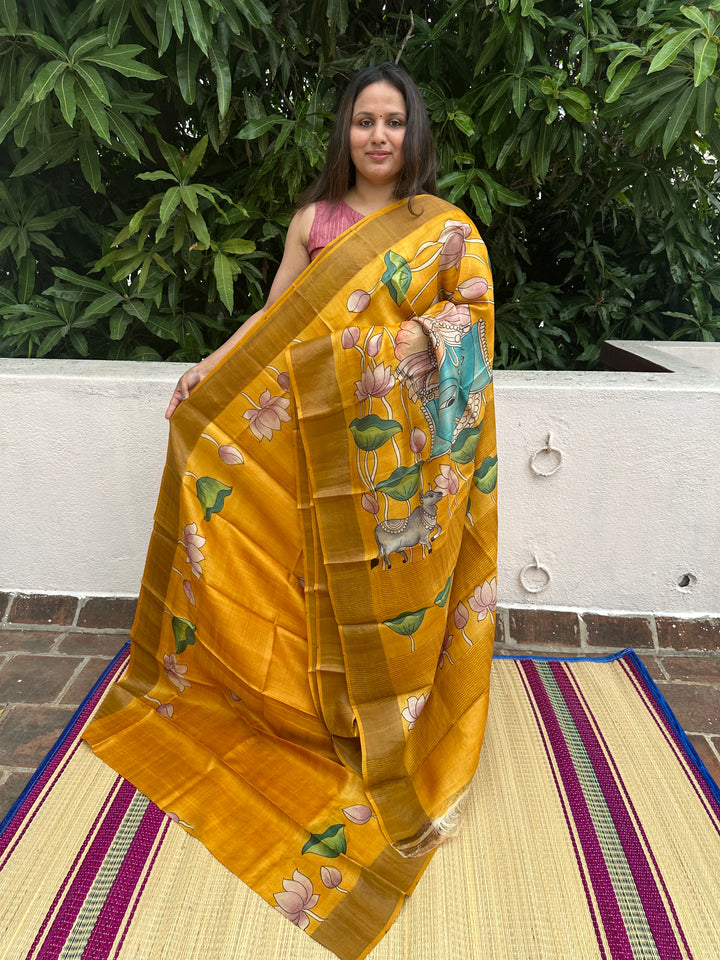 Mustard Colour Saree with Pichwai Lotus Motifs in Body , Pichwai Cow and Lord Krish Painting in Pallu,  Handpainted Pure Tussar Silk Saree