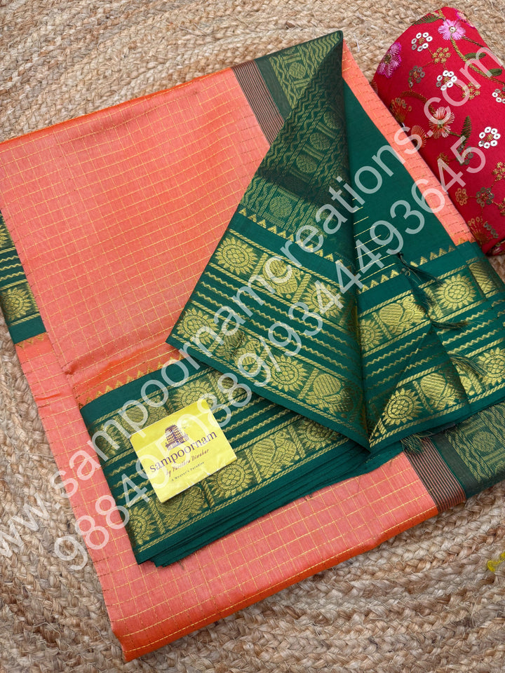 Light Kanakambaram with Green  , rich Zari Kattam in the body , rettapet border and rich Pallu Korvai Silk Cotton Saree