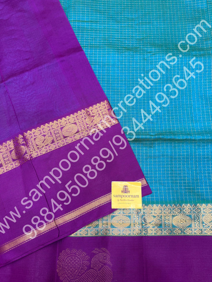 Ocean Teal with Purple  , rich Zari Kattam in the body , traditional Annam motif  border and rich Pallu Korvai Silk Cotton Saree