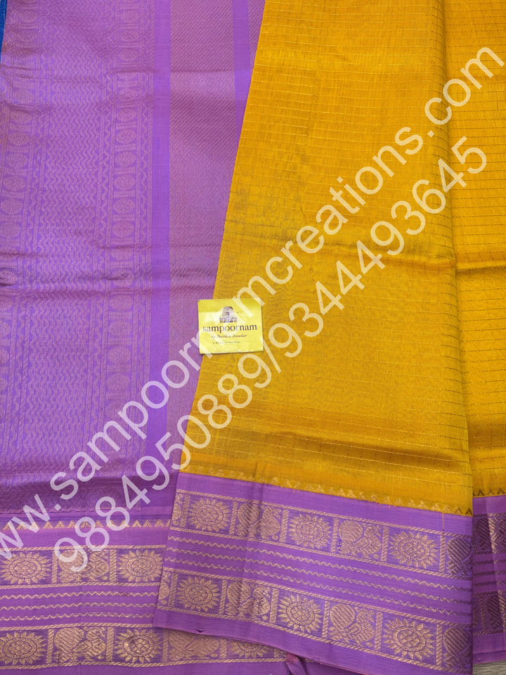 Turmeric Yellow with Lavender , rich Zari Kattam in the body , traditional border and rich Pallu Korvai Silk Cotton Saree