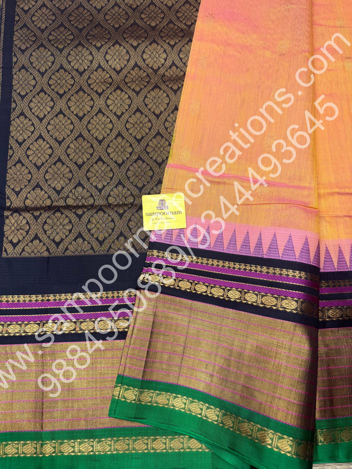 Peach with Black , rich floral Zari butta in the body , One side Long border and  Grand Pallu Korvai Silk Cotton Saree