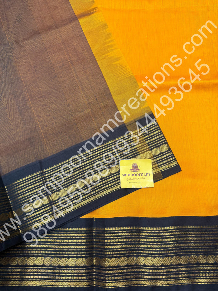 Yellow with Bottle Green  , traditional  border with rich  Pallu Korvai Silk Cotton Saree