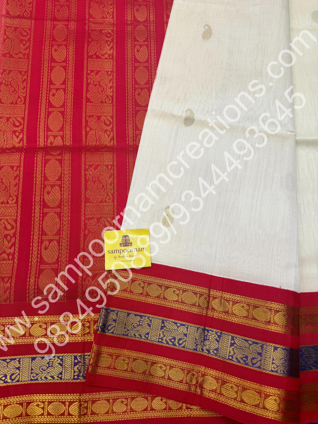 Cream with Red , rich Mango and Rudraksh Zari butta in the body , traditional Kanchi Borders , rich traditional borders and Grand Pallu Korvai Silk Cotton Saree