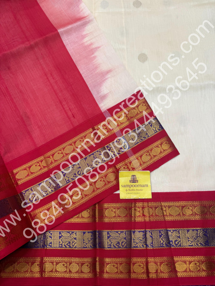 Cream with Red , rich Mango and Rudraksh Zari butta in the body , traditional Kanchi Borders , rich traditional borders and Grand Pallu Korvai Silk Cotton Saree