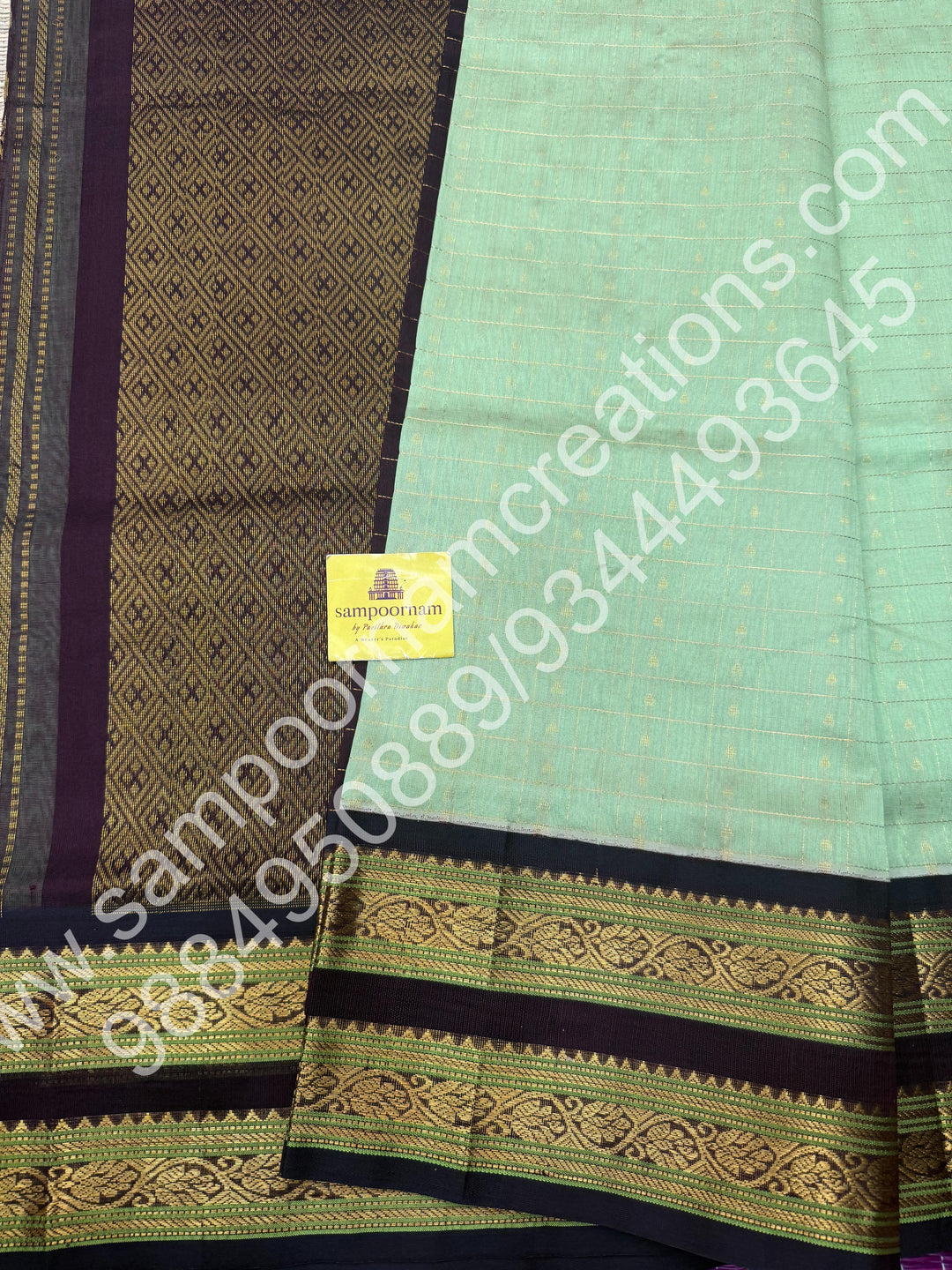 Mint Green with Dark Brown  , rich Zari Kattam with Butta  in the body , rettaapet  border and rich Pallu Korvai Silk Cotton Saree
