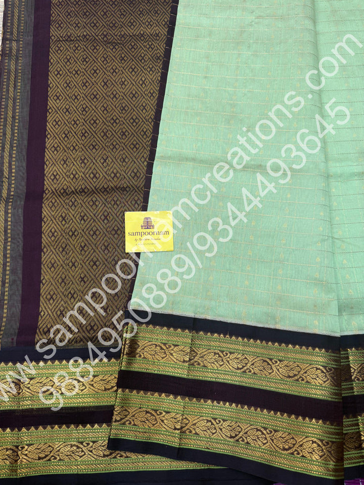 Mint Green with Dark Brown  , rich Zari Kattam with Butta  in the body , rettaapet  border and rich Pallu Korvai Silk Cotton Saree
