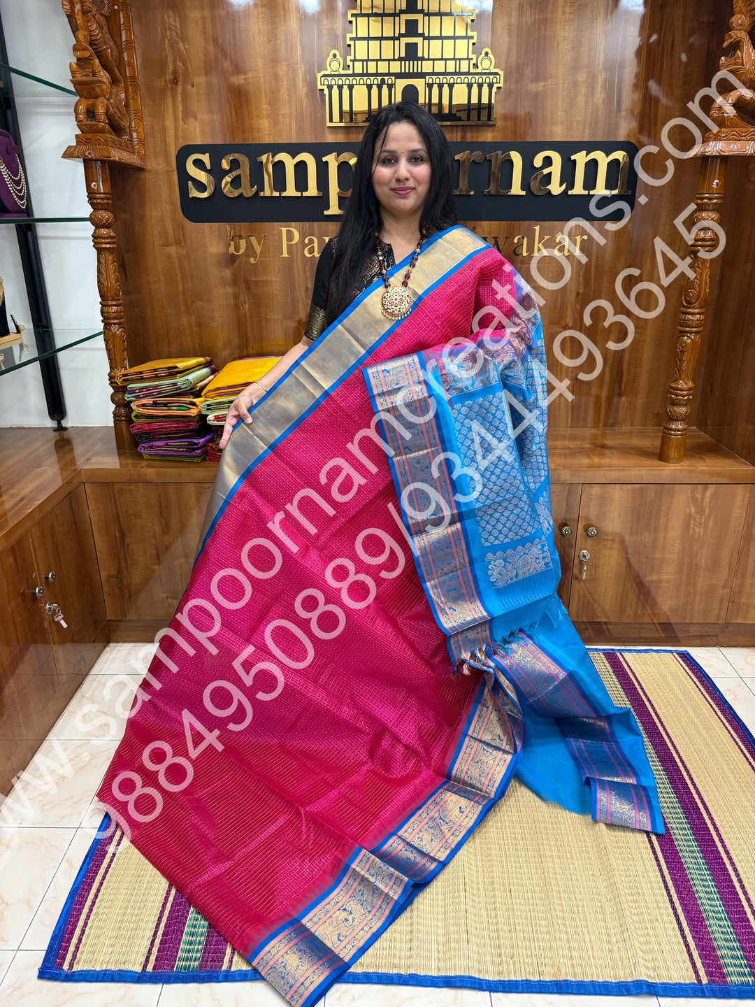 Hot Pink with Ramar Blue , rich traditional borders and Lakshadeepam Zari Buttas all over the body and Grand Pallu Korvai Silk Cotton Saree