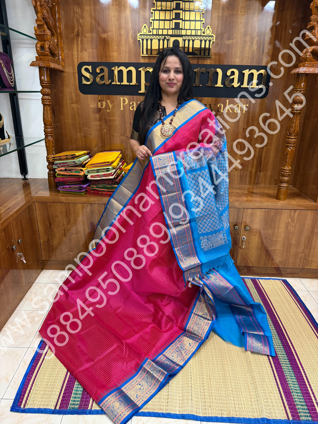 Hot Pink with Ramar Blue , rich traditional borders and Lakshadeepam Zari Buttas all over the body and Grand Pallu Korvai Silk Cotton Saree