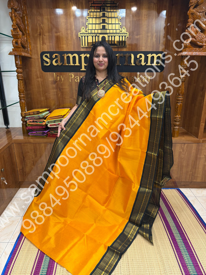Yellow with Bottle Green  , traditional  border with rich  Pallu Korvai Silk Cotton Saree