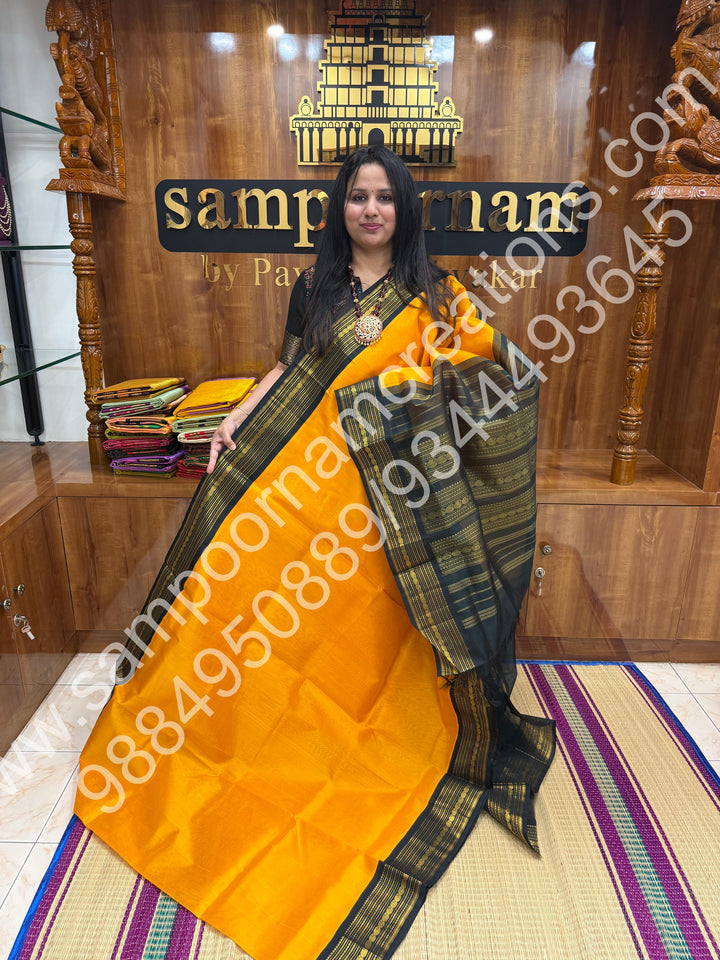 Yellow with Bottle Green  , traditional  border with rich  Pallu Korvai Silk Cotton Saree