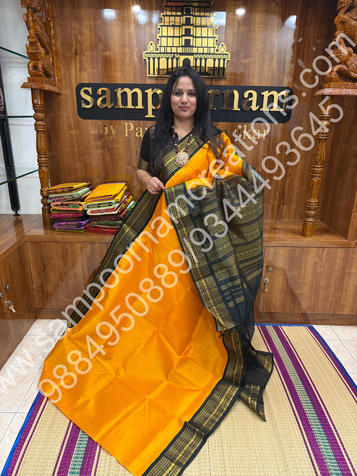 Yellow with Bottle Green  , traditional  border with rich  Pallu Korvai Silk Cotton Saree