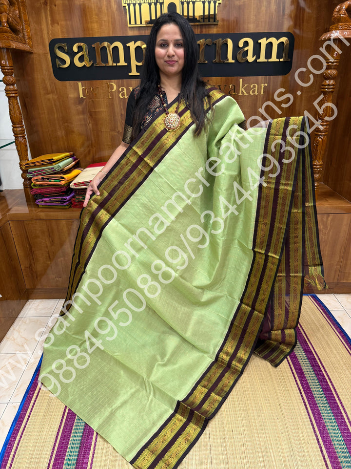 Mint Green with Dark Brown  , rich Zari Kattam with Butta  in the body , rettaapet  border and rich Pallu Korvai Silk Cotton Saree