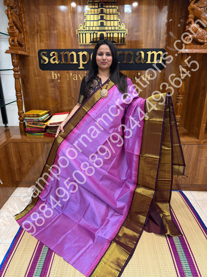Lavender with Arakku  , rich Zari Kattam in the body , traditional One side Long border and rich Pallu Korvai Silk Cotton Saree
