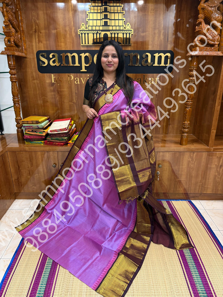 Lavender with Arakku  , rich Zari Kattam in the body , traditional One side Long border and rich Pallu Korvai Silk Cotton Saree