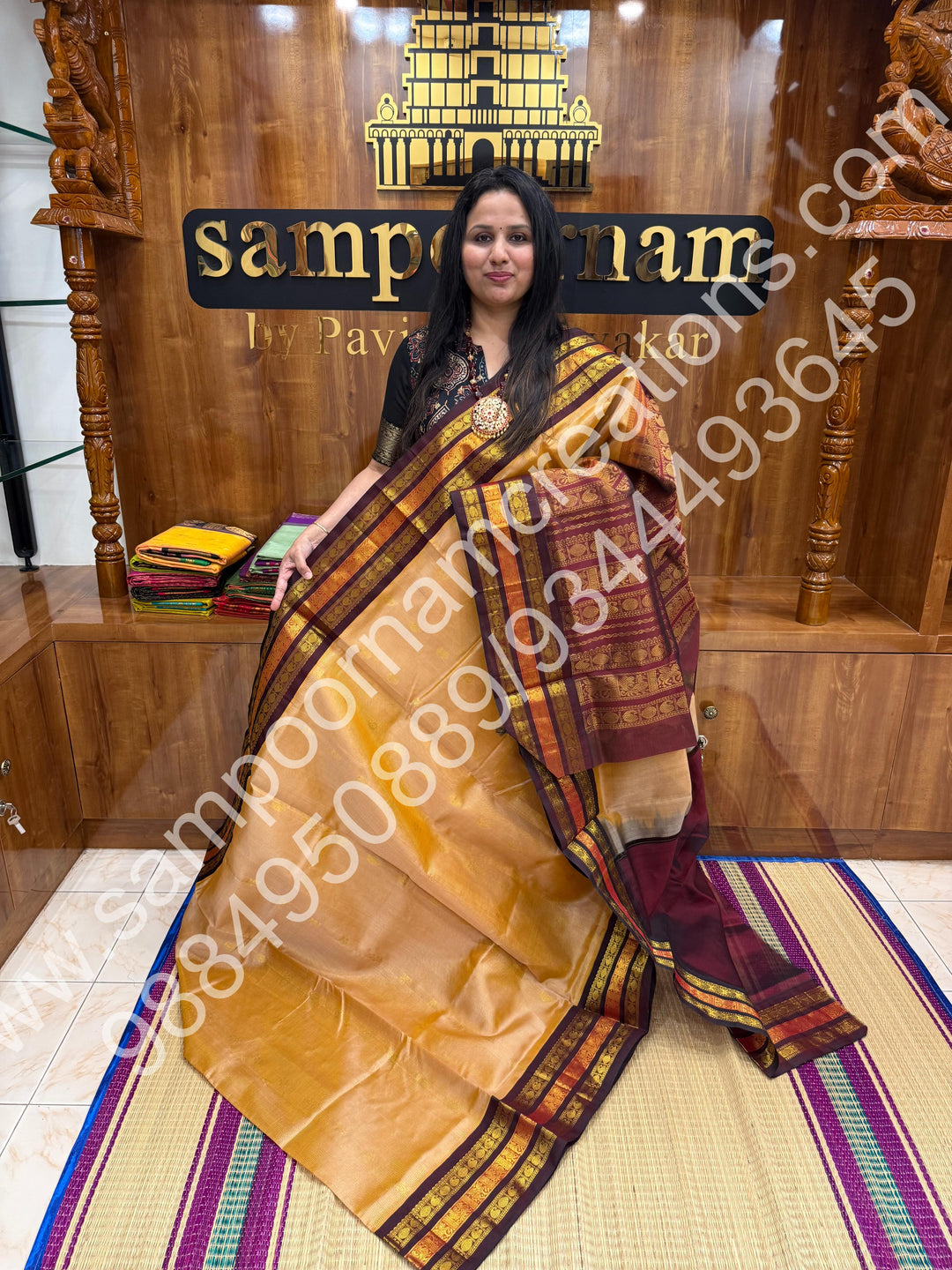 Biscuit with Brown  , rich Zari Podi Kattam with Mango butta in the body , traditional Kanchi border and rich Pallu Korvai Silk Cotton Saree