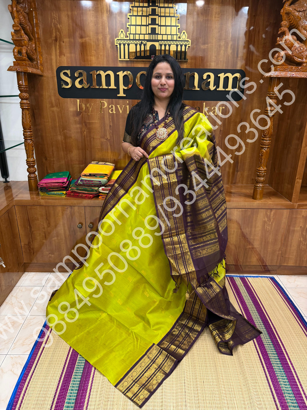 Manthulir with Dark Brown , Rich Annam Zari butta in the body , traditional Kanchi Borders and Grand Pallu Korvai Silk Cotton Saree