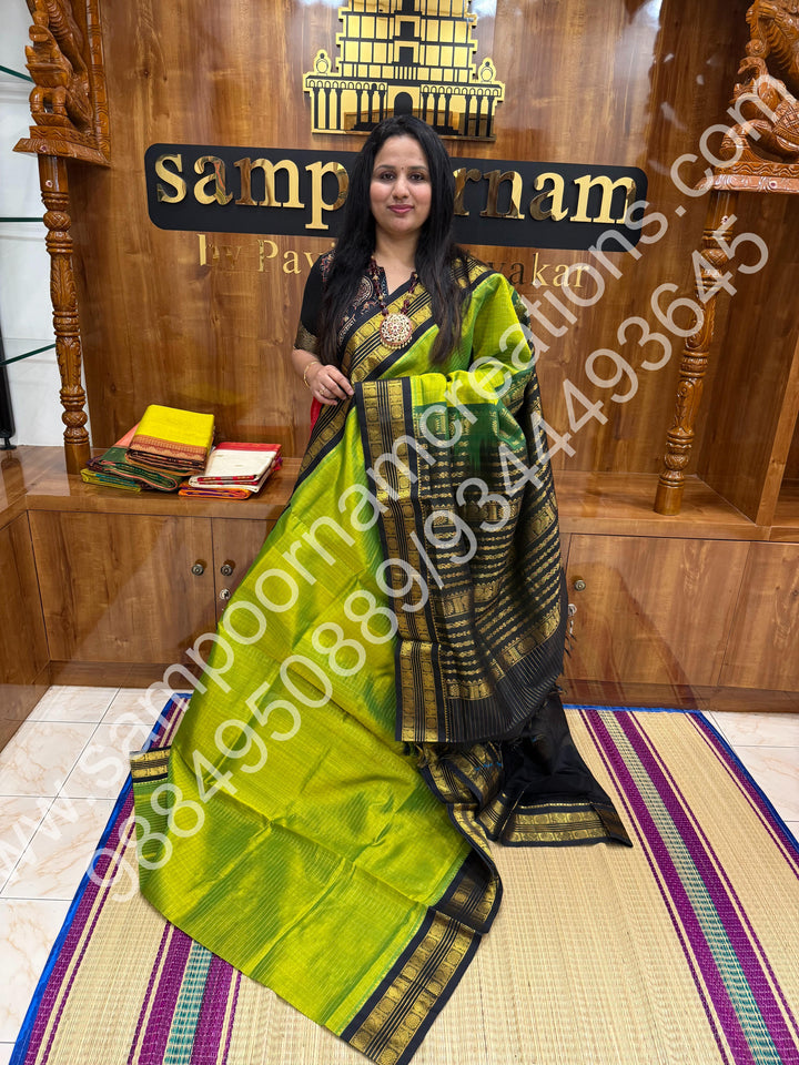 Parrot Green with Black  , rich Zari Kattam in the body , rettapet border and rich Pallu Korvai Silk Cotton Saree