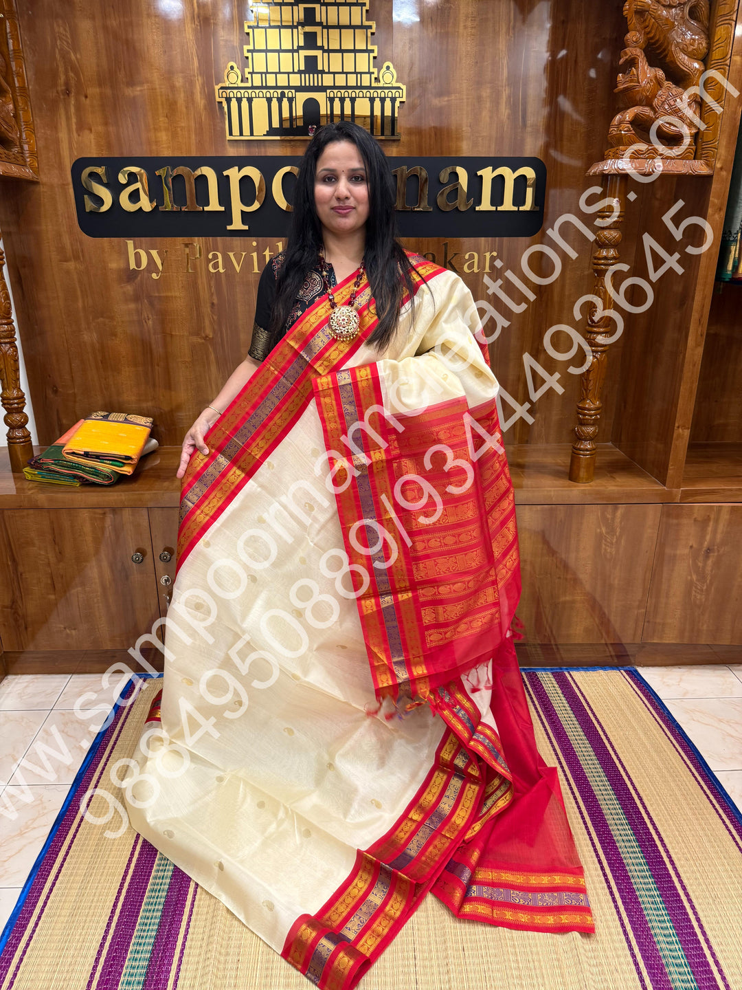 Cream with Red , rich Mango and Rudraksh Zari butta in the body , traditional Kanchi Borders , rich traditional borders and Grand Pallu Korvai Silk Cotton Saree