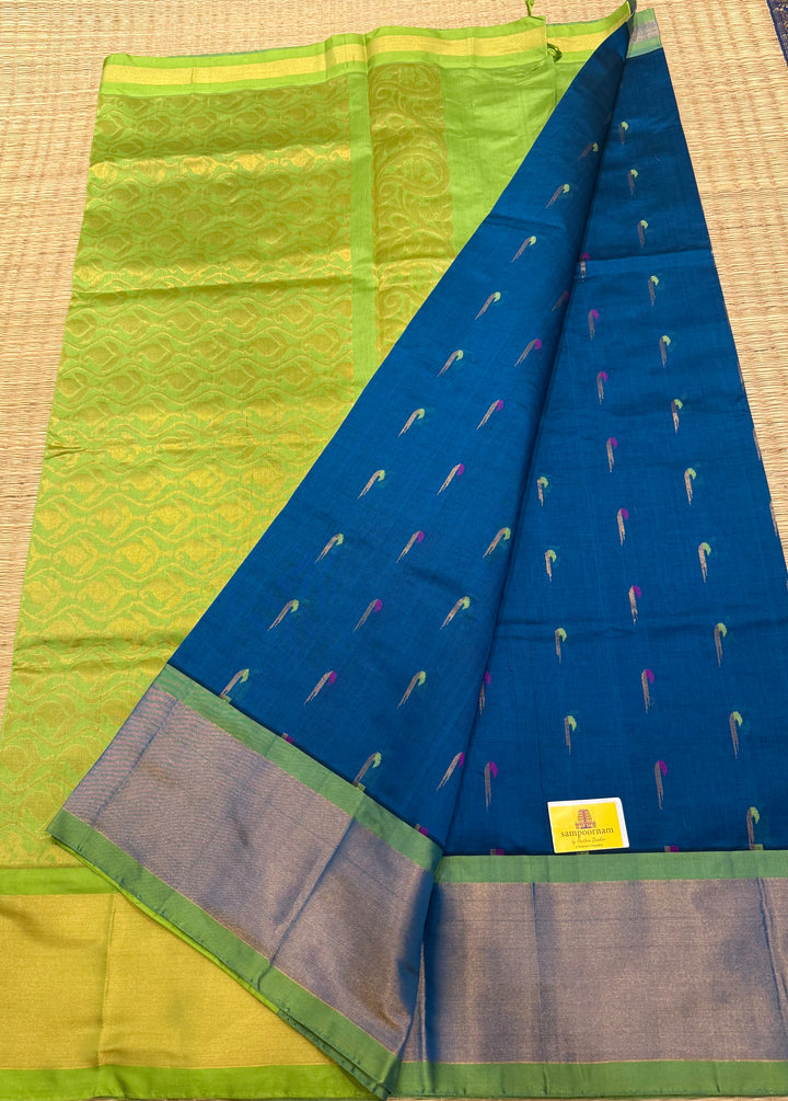 Blue with green ,paithani inspried rich butta in the body,traditional borders and rich pallu semi silk cotton saree
