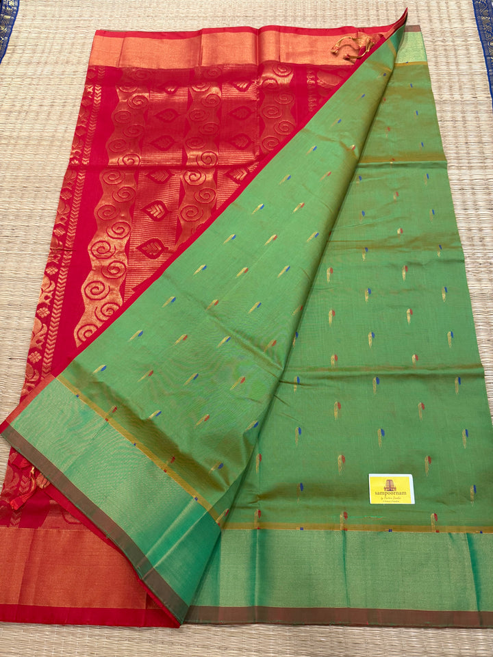 Green with red ,paithani inspried rich butta in the body,traditional borders and rich pallu semi silk cotton saree