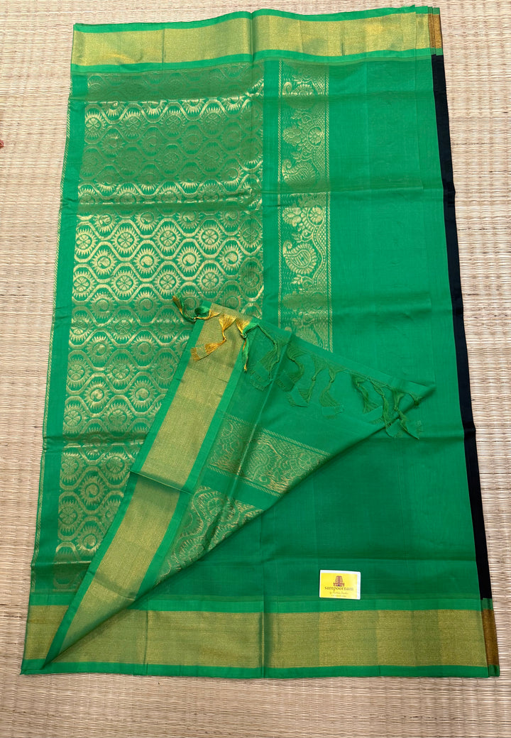 Black with green ,mango and annam rich butta in the body,traditional borders and rich pallu semi silk cotton saree