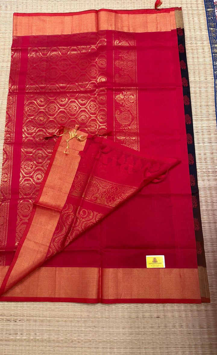 Black with red,mango and annam rich butta in the body,traditional borders and rich pallu semi silk cotton saree