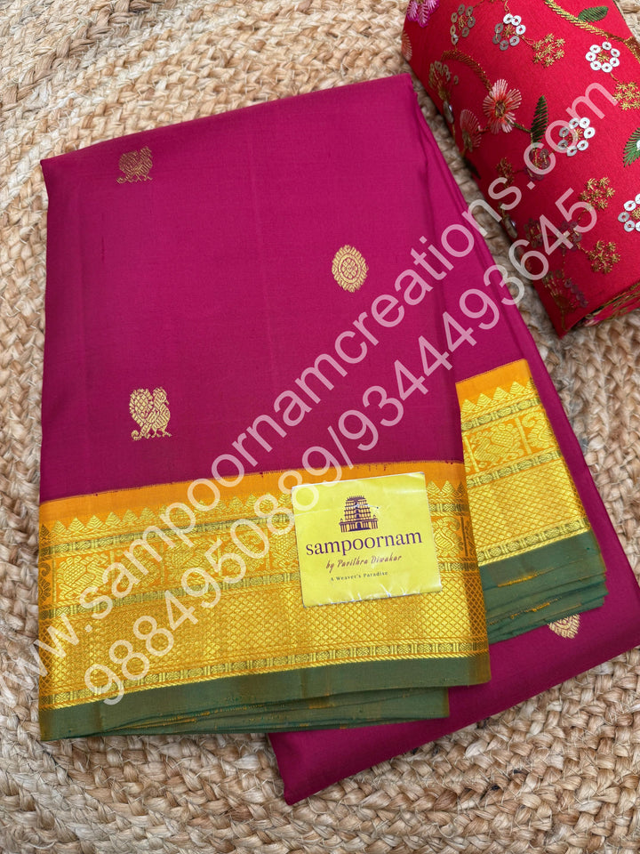 Kumkum Red with Mustard , Rich Mayil and Chakram  butta in the body , Traditional borders and Rich Pallu , Pure Kanjivaram Silk Saree