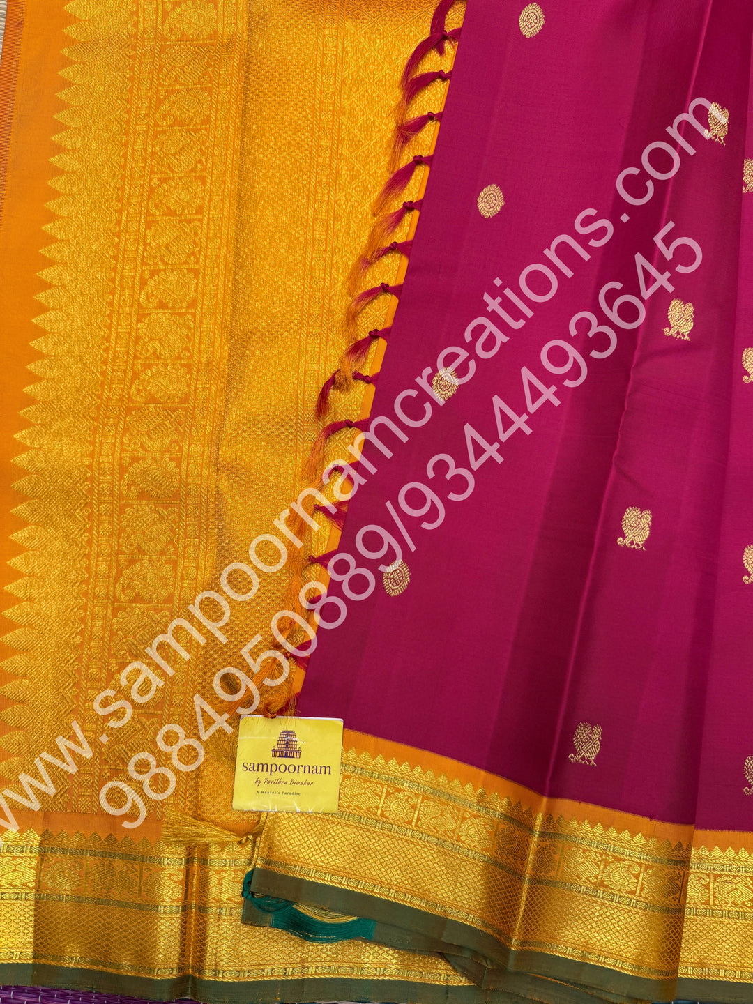 Kumkum Red with Mustard , Rich Mayil and Chakram  butta in the body , Traditional borders and Rich Pallu , Pure Kanjivaram Silk Saree