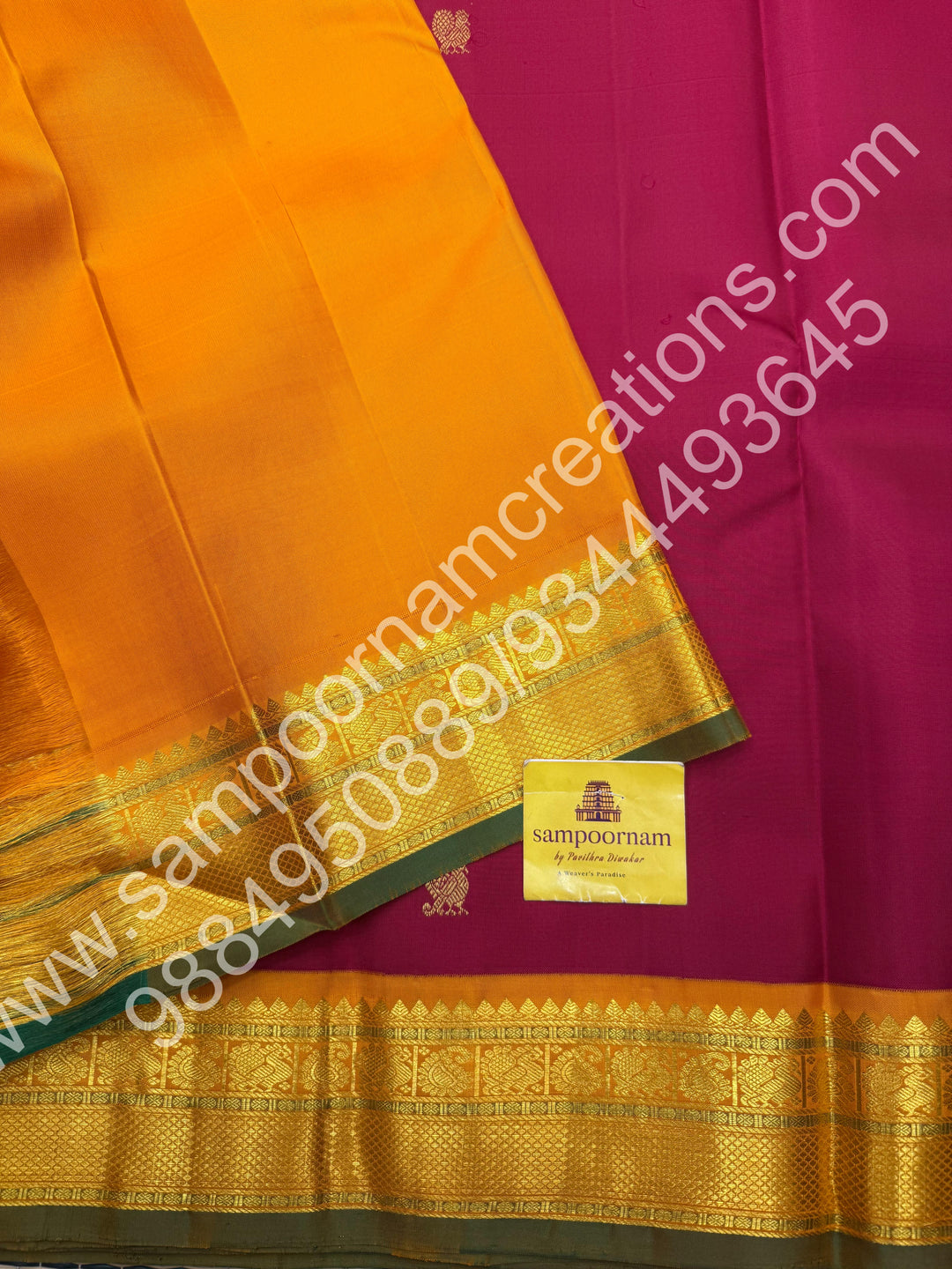 Kumkum Red with Mustard , Rich Mayil and Chakram  butta in the body , Traditional borders and Rich Pallu , Pure Kanjivaram Silk Saree