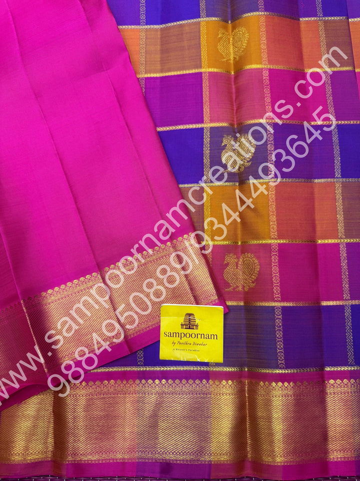 Pink , Purple , Mustard , Orange with Pink , Rich Mayil and Chakram  butta in the body with Zari checks , Traditional borders and Rich Pallu , Pure Kanjivaram Silk Saree