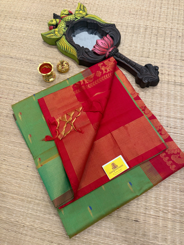 Green with red ,paithani inspried rich butta in the body,traditional borders and rich pallu semi silk cotton saree