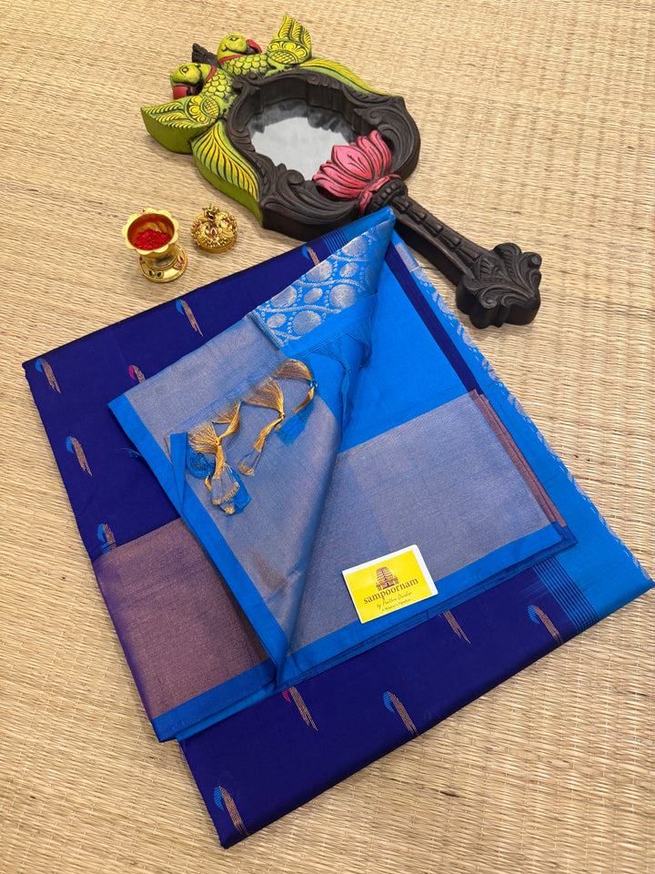 Blue with blue ,paithani inspried rich butta in the body,traditional borders and rich pallu semi silk cotton saree