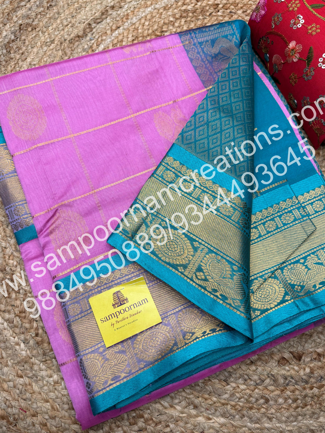 Baby Pink with Turquoise blue, Rich Mayil and Chakram butta in the body with Zari Checks, traditional borders and Rich Pallu , Pure Silk Cotton Saree