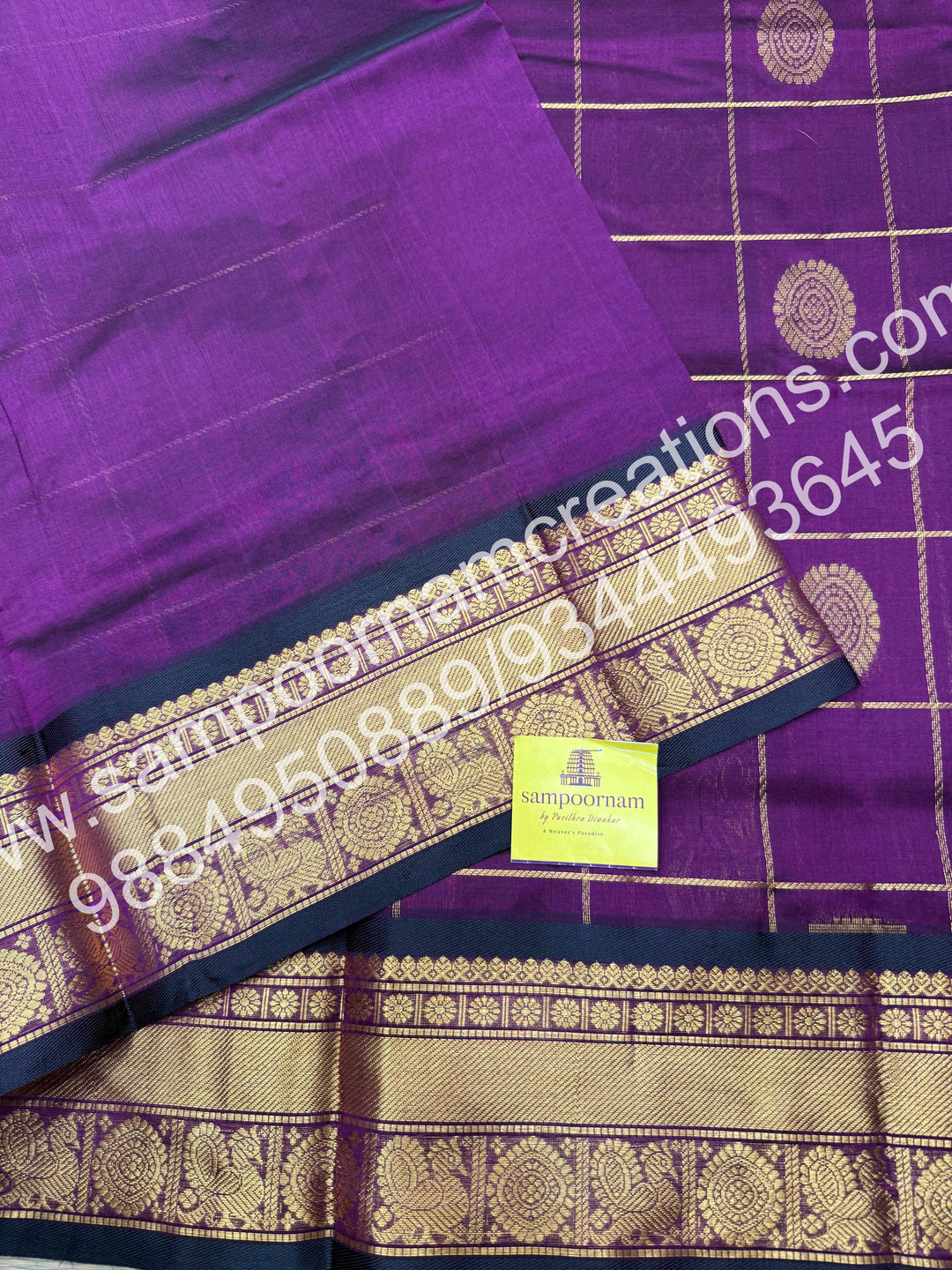 Beetroot Purple , Rich Mayil and Chakram butta in the body with Zari Checks, traditional borders and Rich Pallu , Pure Silk Cotton Saree