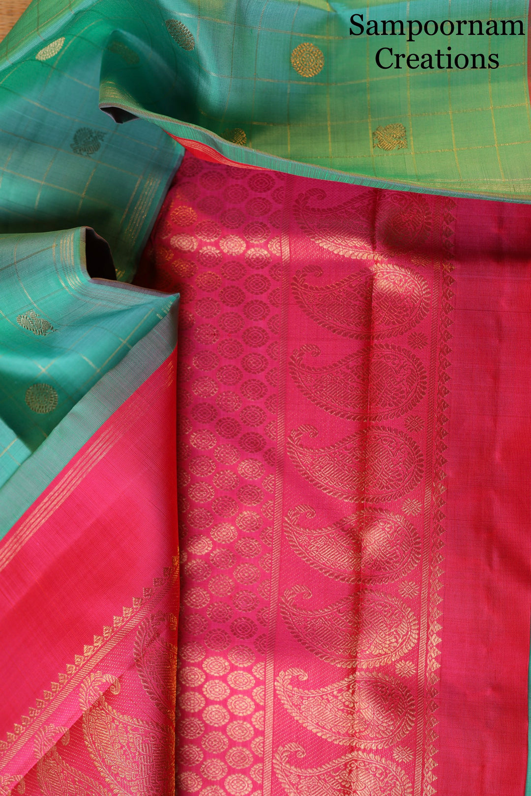 Sea Green with Pink Borderless Body Zari Checks with Mayil Chakram Butta and Rich Pallu- Pure silk Pure Zari Kanjivaram Silk Saree