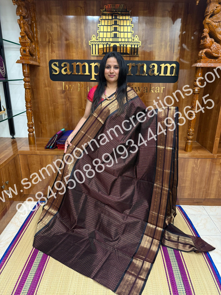 Dark Coffee Brown , Rich Traditional Borders and Lakshadeepam Zari Butta all over the body and Grand Pallu , Pure Silk Cotton Saree