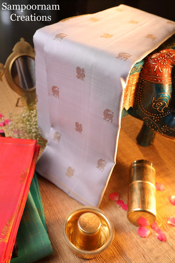 A stunning Cement Grey with Pink Borderless Annam and Yazhi Zari Motif , Rich Pallu - Pure silk Pure Zari Kanjivaram Silk Saree