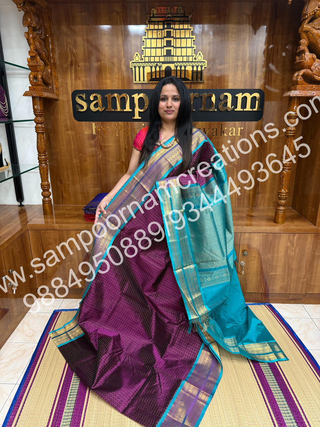 Wine with Turquoise Blue , Rich Traditional Borders and Lakshadeepam Zari Butta all over the body and Grand Pallu , Pure Silk Cotton Saree