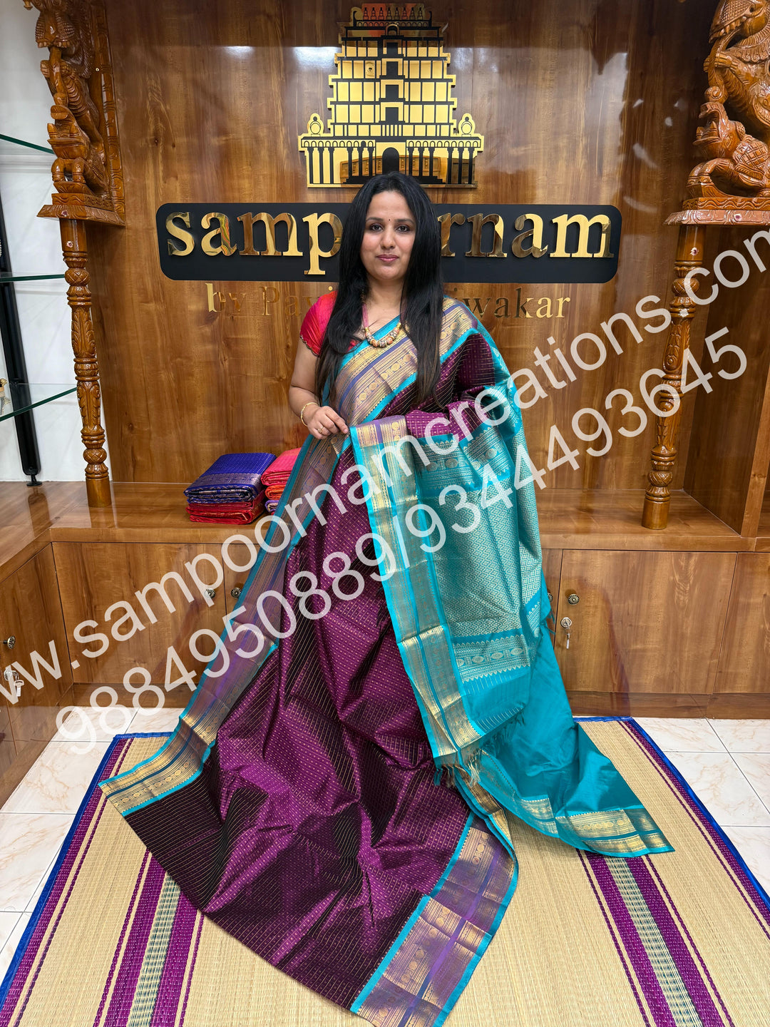 Wine with Turquoise Blue , Rich Traditional Borders and Lakshadeepam Zari Butta all over the body and Grand Pallu , Pure Silk Cotton Saree