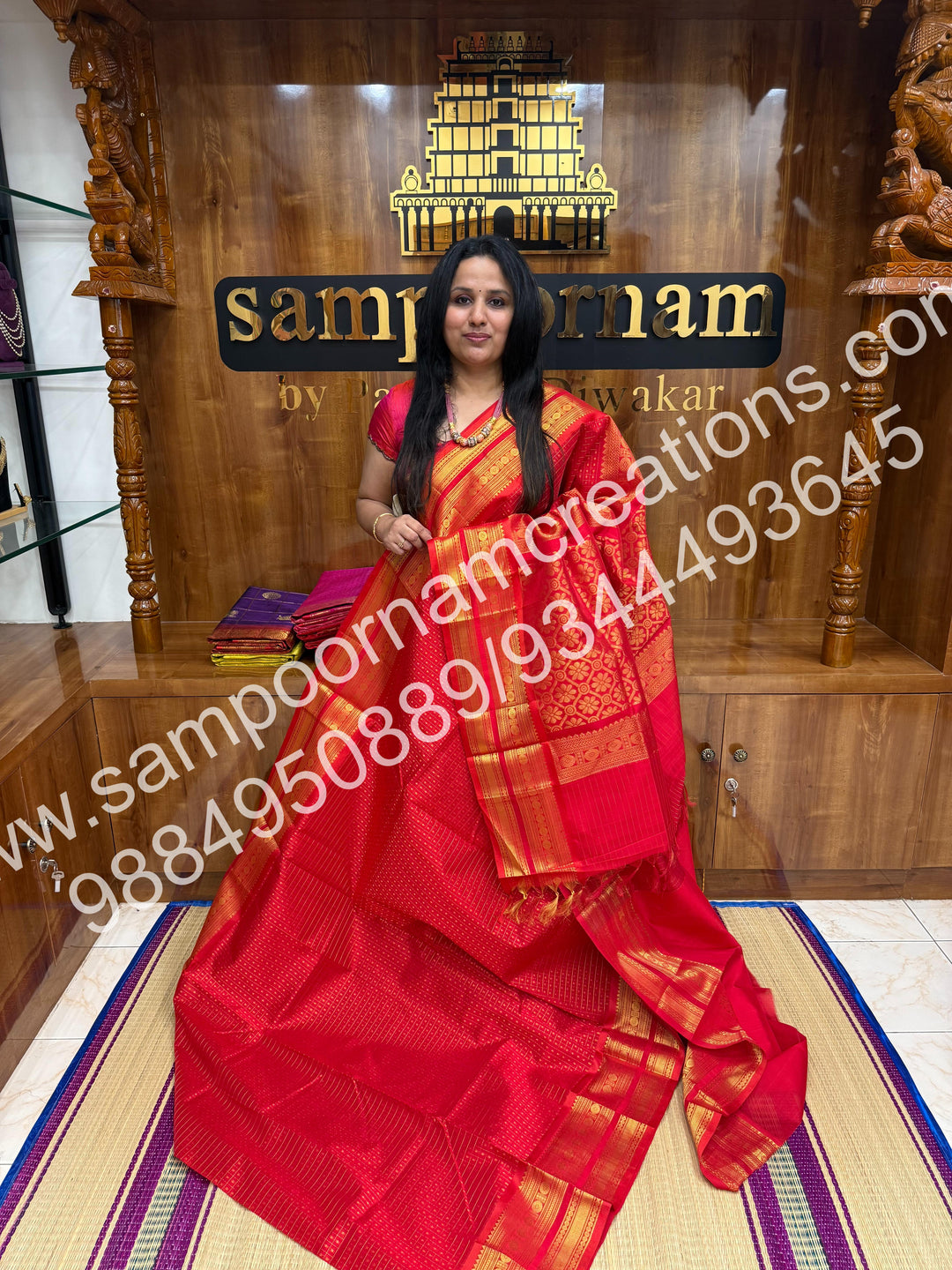 Red , Rich Traditional Borders and Lakshadeepam Zari Butta all over the body and Grand Pallu , Pure Silk Cotton Saree