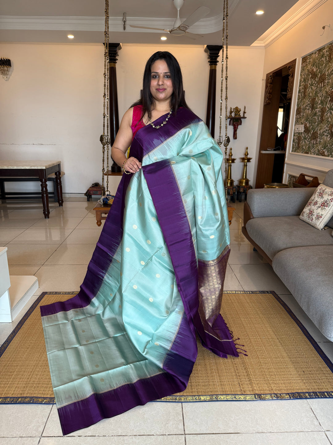 Ice Blue with Indigo, rich Rudraksha zari butta in the body and an elaborate rich Pallu Pure Soft Silk Saree