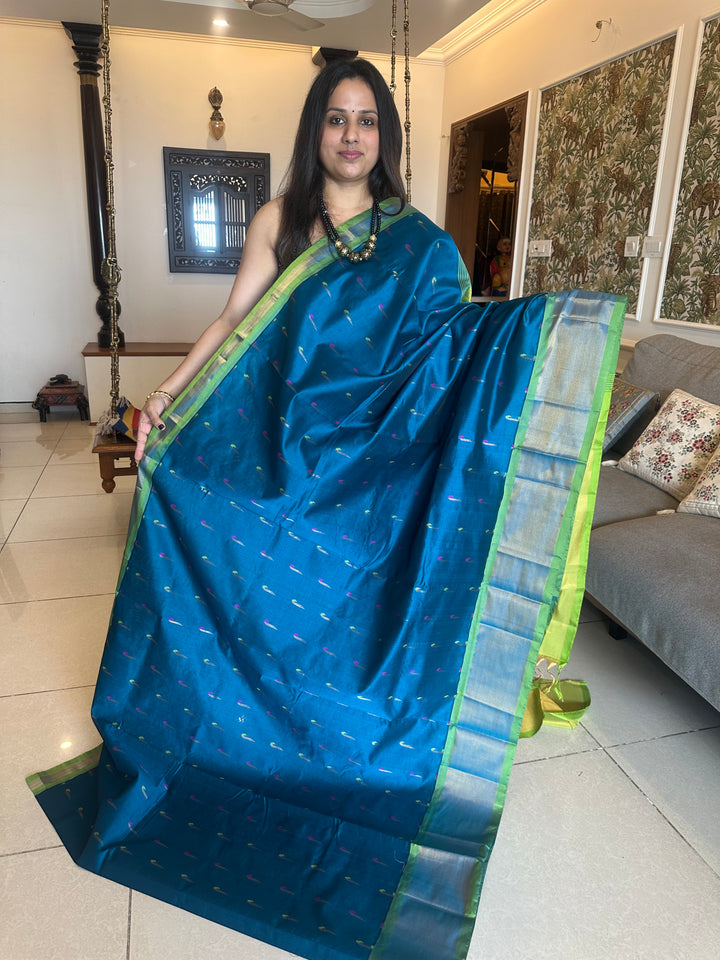 Blue with green ,paithani inspried rich butta in the body,traditional borders and rich pallu semi silk cotton saree