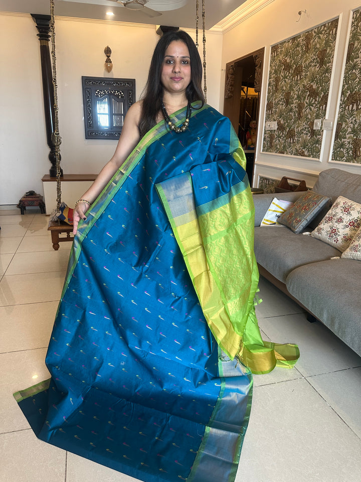 Blue with green ,paithani inspried rich butta in the body,traditional borders and rich pallu semi silk cotton saree