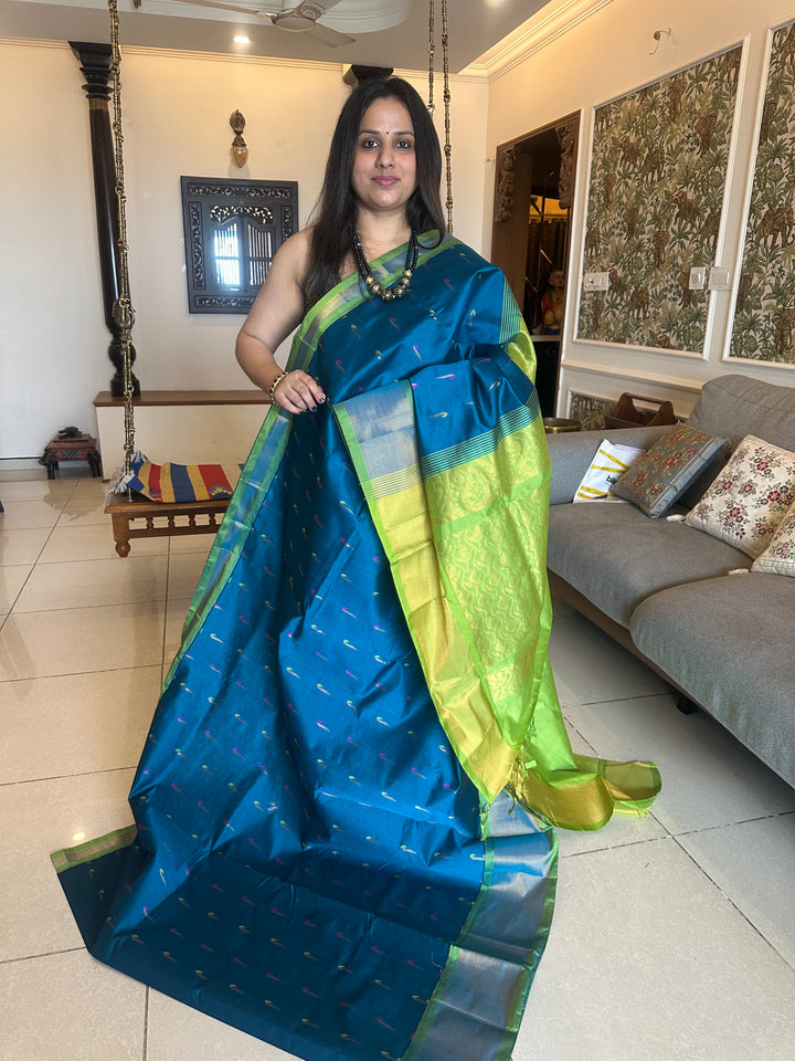 Blue with green ,paithani inspried rich butta in the body,traditional borders and rich pallu semi silk cotton saree