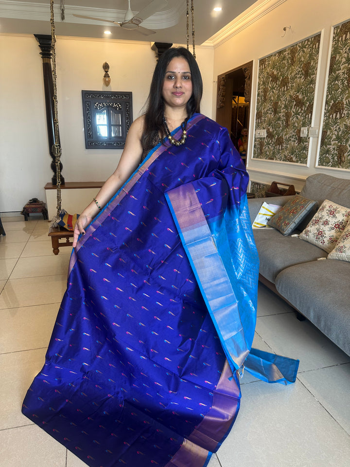 Blue with blue ,paithani inspried rich butta in the body,traditional borders and rich pallu semi silk cotton saree