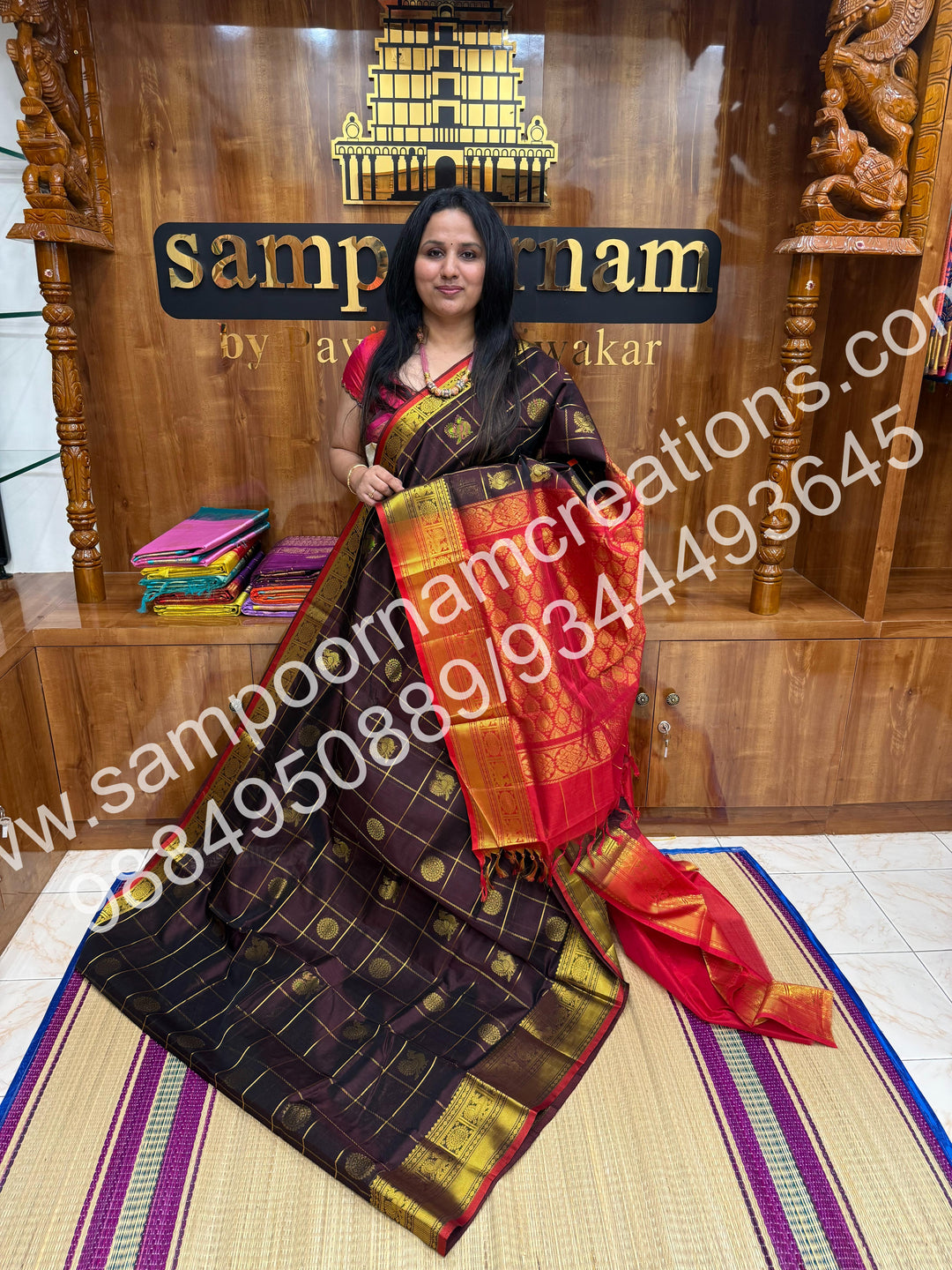 Brown with Red , Rich Mayil and Chakram butta in the body with Zari Checks, traditional borders and Rich Pallu , Pure Silk Cotton Saree