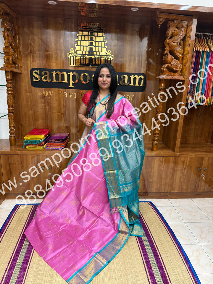 Baby Pink with Turquoise blue, Rich Mayil and Chakram butta in the body with Zari Checks, traditional borders and Rich Pallu , Pure Silk Cotton Saree