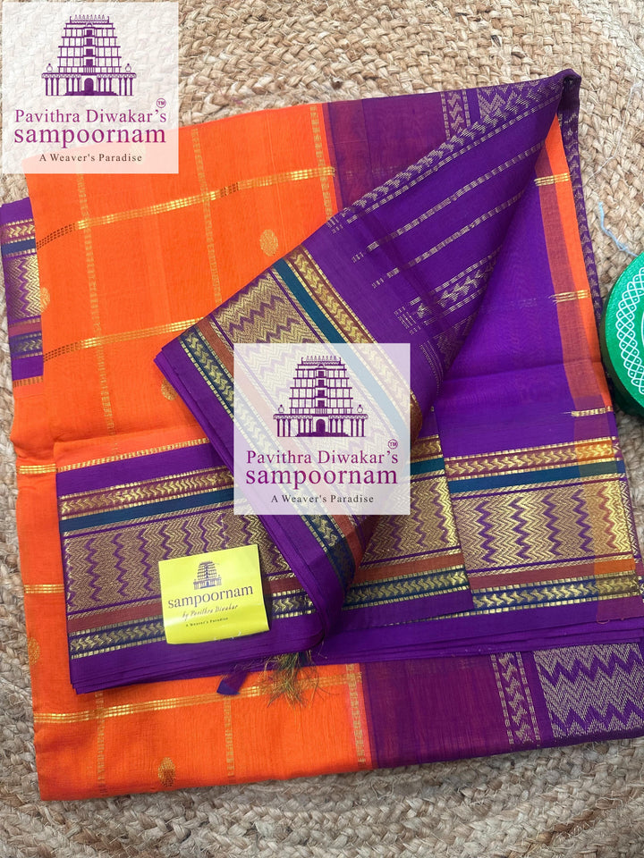 Orange with Purple , rich Zari butta , traditional borders and rich Pallu Korvai Silk Cotton Saree